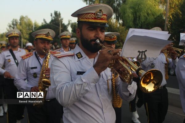 غبارروبی مزار شهدای قم با حضور کارکنان پدافند هوایی ارتش