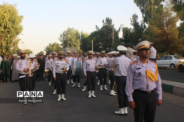 غبارروبی مزار شهدای قم با حضور کارکنان پدافند هوایی ارتش