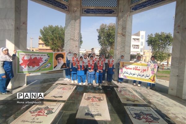 غبارروبی وعطرافشانی مزار شهدای شادگان