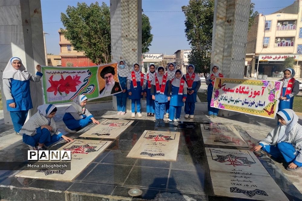 غبارروبی وعطرافشانی مزار شهدای شادگان