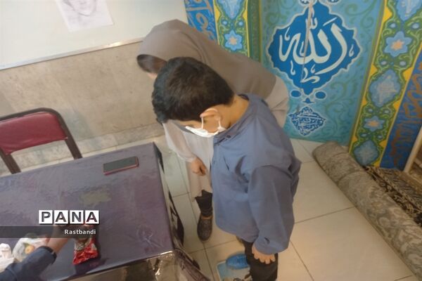 برگزاری طرح معاینه سلامتی در دبیرستان پسرانه ادیب(دوره اول)
