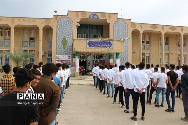 نواختن زنگ نمادین استکبار ستیزی در حمیدیه