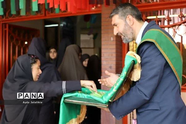 پرچم بارگاه حضرت معصومه(س) درهنرستان ولایت اسلامشهر