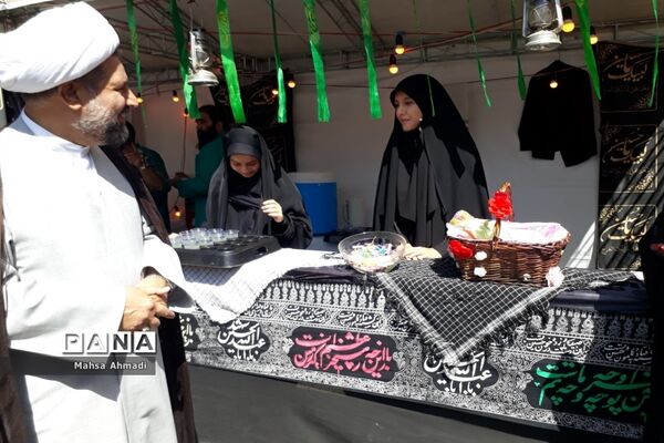 نمایشگاه هفته دفاع‌مقدس در مصلی شهرستان رباط‌کریم