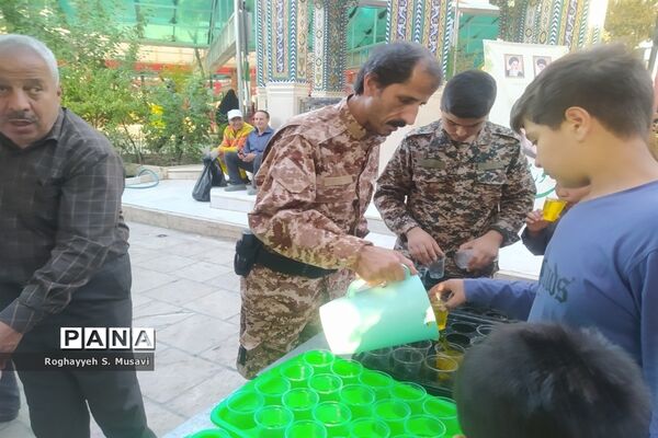 آیین گلباران مزار شهدا به‌مناسبت هفته دفاع مقدس