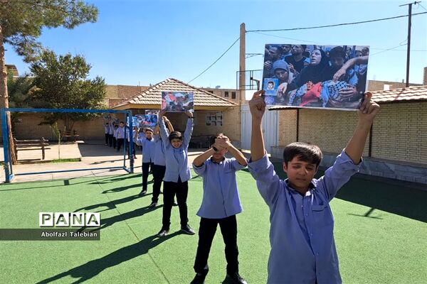 زنجیره انسانی دانش‌آموزان اشکذری در حمایت از غزه