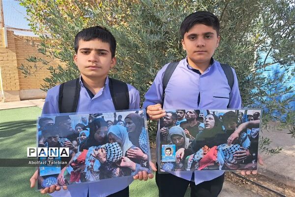 زنجیره انسانی دانش‌آموزان اشکذری در حمایت از غزه