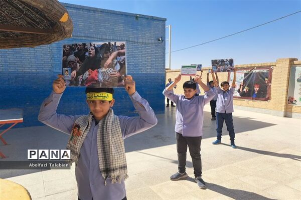 زنجیره انسانی دانش‌آموزان اشکذری در حمایت از غزه