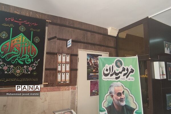 نمایشگاه عکس شهدای عاشورایی و فضاسازی محرم در دبیرستان شهید بهشتی رودهن