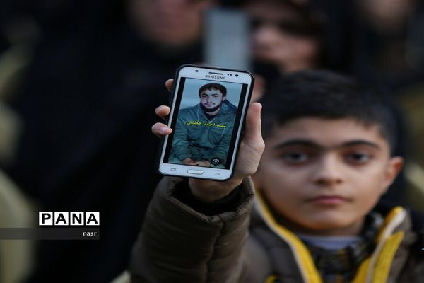 آیین ادای احترام و غبارروبی مزار شهدای مدافع حرم منطقه ۱۴ شهرداری اصفهان