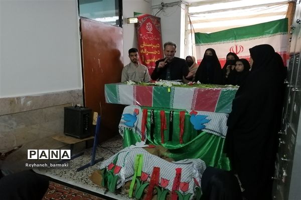آیین  وداع با پیکر شهید گمنام در دبیرستان شهید عباسی ناحیه۷ مشهد