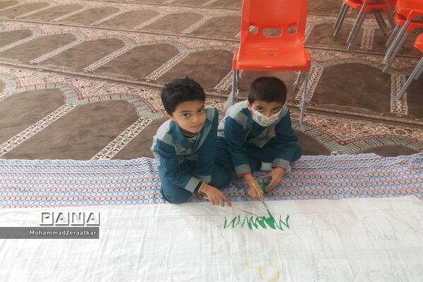اجرای نقاشی همگانی یاران حاج قاسم در دبستان شاهد کاشمر