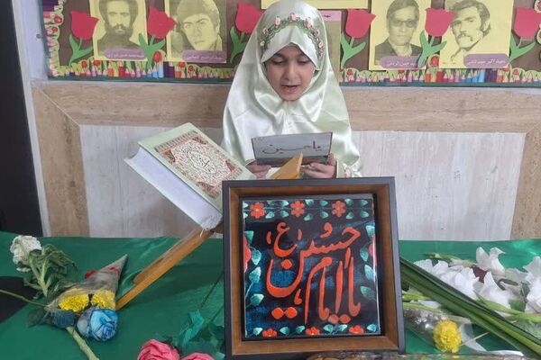 پرچم متبرک امام حسین(ع) میهمان دانش‌آموزان مدرسه زنده‌یاد قمصری