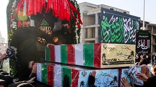 بدرقه پیکر مطهر ۱۳ شهید گمنام در اجتماع عظیم فاطمیون مشهد