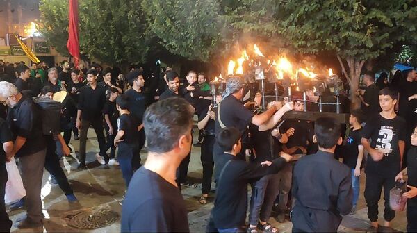 آیین مشعل‌گردانی نجفی‌های مقیم قم