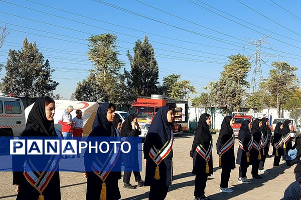 نواختن زنگ پدافند غیرعامل در هنرستان کوثر باقرشهر 