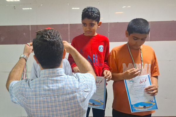 مراسم تقدیر از دانش‌آموزان مقام‌آور در مسابقات شنا در شیراز 