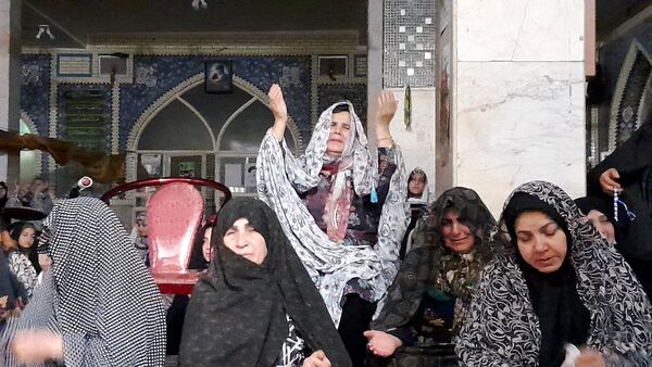 پرچم حرم حضرت عباس(ع) در مراسم اعتکاف شهرستان بن