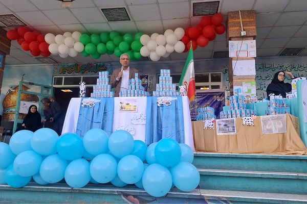  توزیع شیر در دبستان علی‌اکبر طالبی شهرری