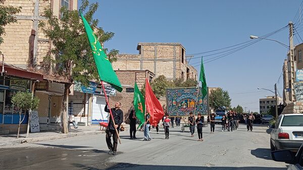 خیابان‌های بن، رنگ ماتم گرفت: تشییع نمادین پیکر امام هشتم