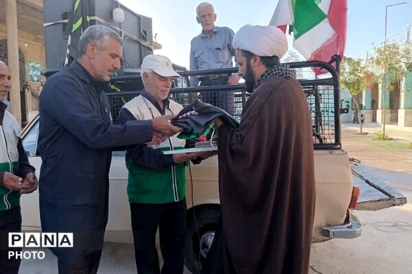 برافراشته شدن پرچم عزای حسینی در امامزاده قاسم زرقان
