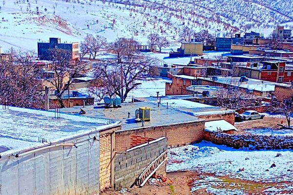 بارش باران و برف زمستانی در روستای کینک