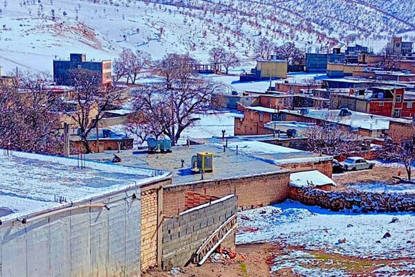 بارش باران و برف زمستانی در روستای کینک