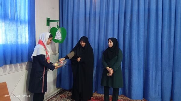 آیین نواختن زنگ پدافند غیرعامل در زاوه