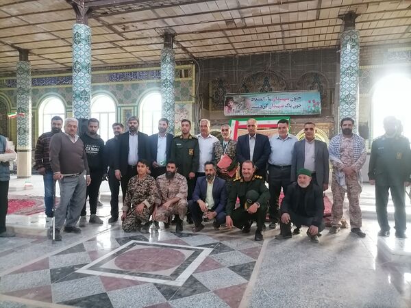 نمایشگاه شهدایی وروایتگری راوی دفاع مقدس در گلزار شهدای شهر بار نیشابور 