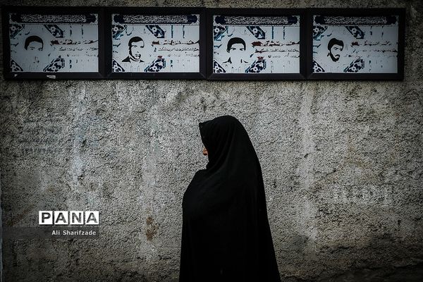 نقش شهدا بر دیوارهای شهر