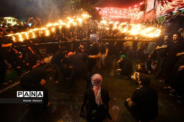 آیین مشعل‌گردانی در دولت‌آباد تهران