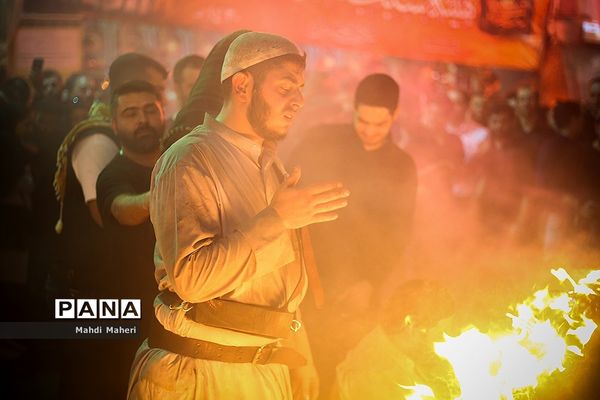 آیین مشعل‌گردانی در دولت‌آباد تهران