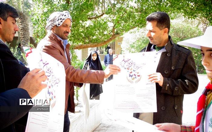 توزیع پوستر هشتمین جشنواره استانی نوجوان سالم بین مدیران مدارس شهرستان شادگان