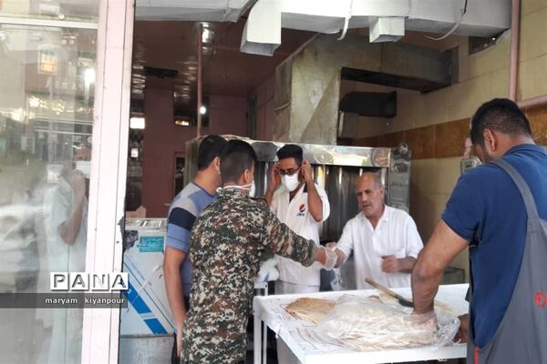 ضدعفونی و گندزدایی اماکن عمومی و توزیع ماسک رایگان در شهرستان مسجدسلیمان