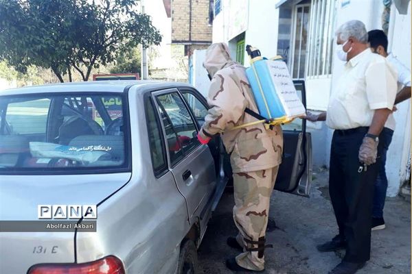 ضدعفونی کردن معابر و اماکن شهری در ساری