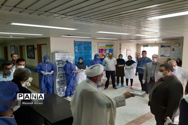 توزیع 400 پرس غذای متبرک آستان قدس رضوی بین کادر درمان و بیماران بیمارستان های میانه