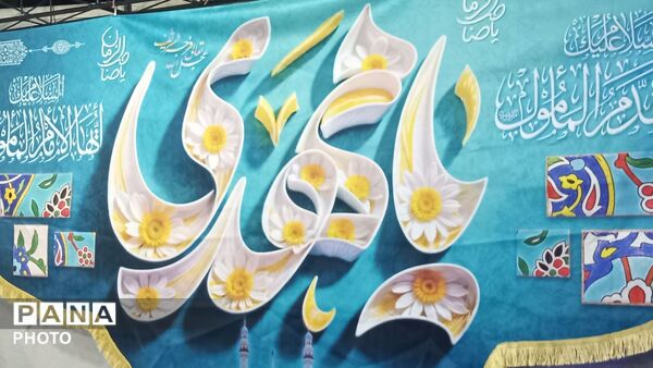 تجمع مردم شهر فردوسیه در دهه امامت در کنار شهدای گمنام