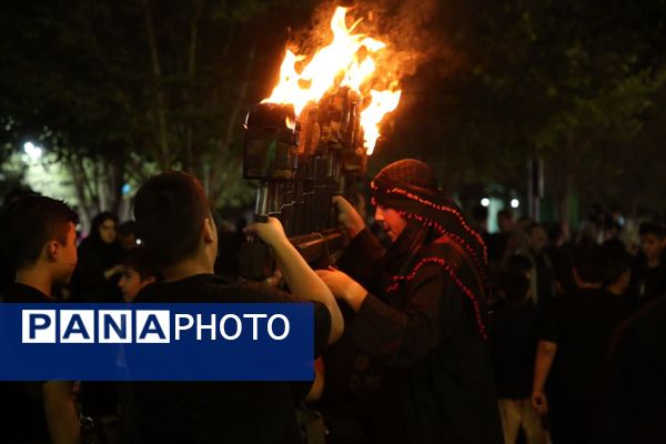 آیین «مشعل گردانی» نجفی‌های مقیم قم