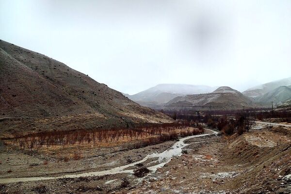 طنین ترانه باران زمستانی در آسمان شهر بار نیشابور 