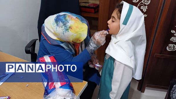 اجرای طرح وارنیش فلوراید در دبستان لطیفه 