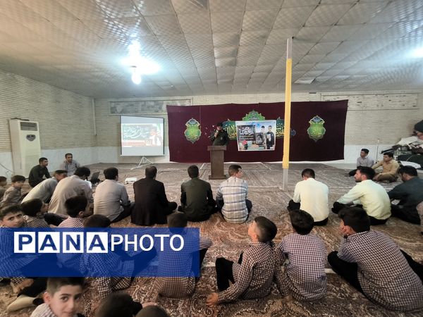 جشن آغاز سال تحصیلی و گرامیداشت هفته دفاع مقدس در حسینیه سیدالشهداء روستای مزرعه شهید بهشتی