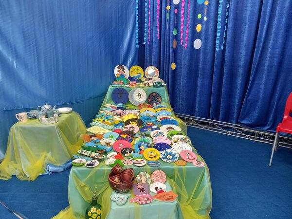 نمایشگاه دست سازه های هنری دختران آفتاب در دالقرآن سازمان فرهنگی شهرداری اسلامشهر