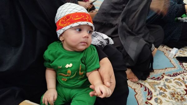 اجتماع شیرخوارگان حسینی در قلعه‌گنج 