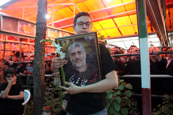 خاکسپاری نوجوان شهید «محمدحسین خاکی» در گلزار شهدای قم