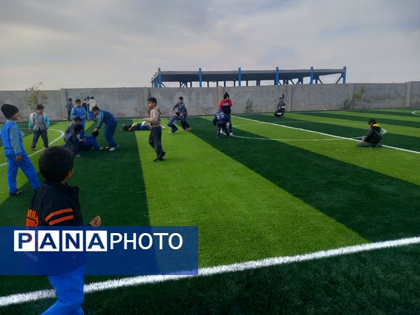 افتتاح زمین چمن مدرسه شهید غلامی خلیل آباد