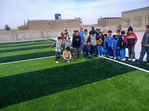 افتتاح زمین چمن مدرسه شهید غلامی خلیل آباد