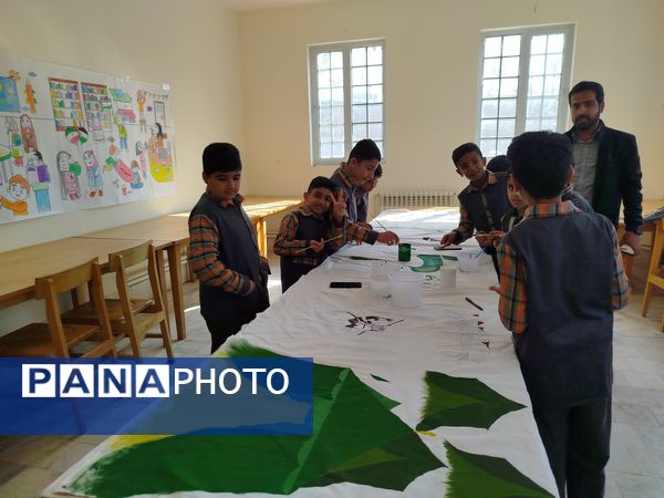 نقاشی همگانی توسط دانش‌آموزان دبستان شهید پسندیده فدافن