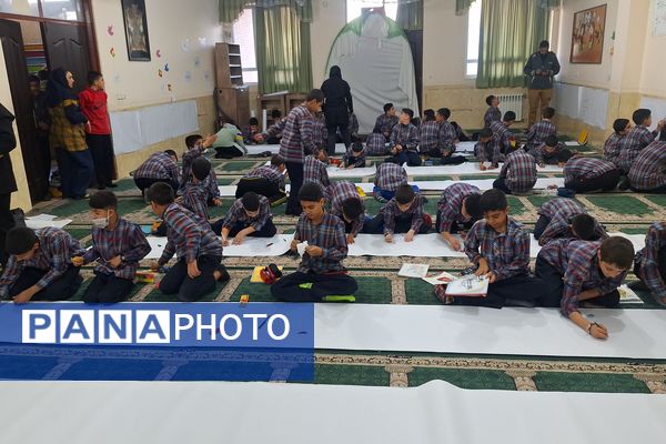 برپایی نقاشی همگانی در هفته ماها در آموزشگاه معارف۶ ناحیه ۳شیراز 