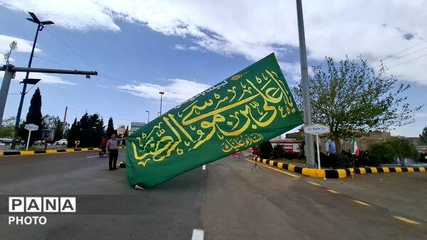 آیین اهتزاز پرچم امام رضا(ع) و رونمایی از دیوارنگاره کودکان میناب در شهر کهک