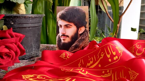 محفل انس با قرآن و یادواره «شهید احمد محمد مشلب» در شهر بن